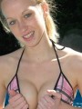 Watch Lucky Play with her boobs by the pool