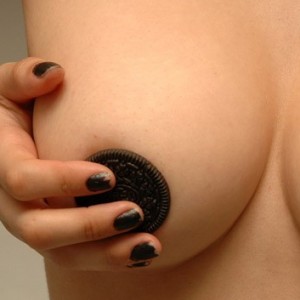 Angel is eating oreos naked