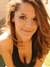 Brittanys works up a sweat in the backyard exercising topless