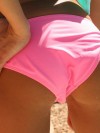 Brittany shows off her tight teen ass in a bikini