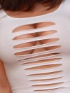 Krissy shows off her huge tits in a ripped top