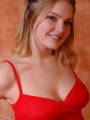 Danielle looks super cute and innocent in her red babydoll and black tight panties