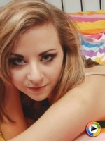 Tight teen Natalia K. shows off her perfect curves in matching bright green bra and panties